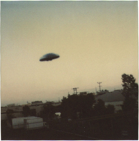 Дисковидный UFO над городом